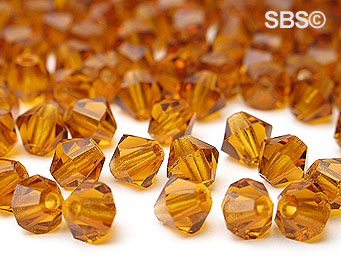 Preciosa 4mm Bicone - Dark Topaz (72) count