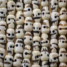 Bone 9mm x 14mm Carved Skull Beads (108)